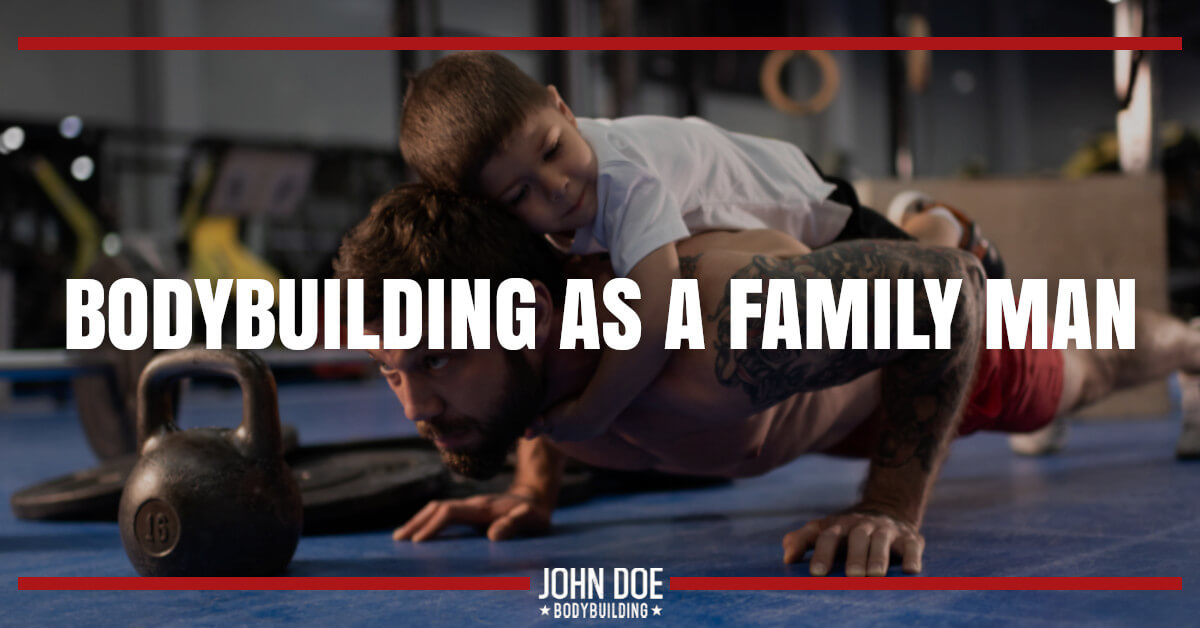 man doing a push-up with son on his back
