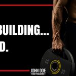 man holding weight plates