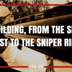 man with shotgun