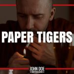 man lighting a cigarette